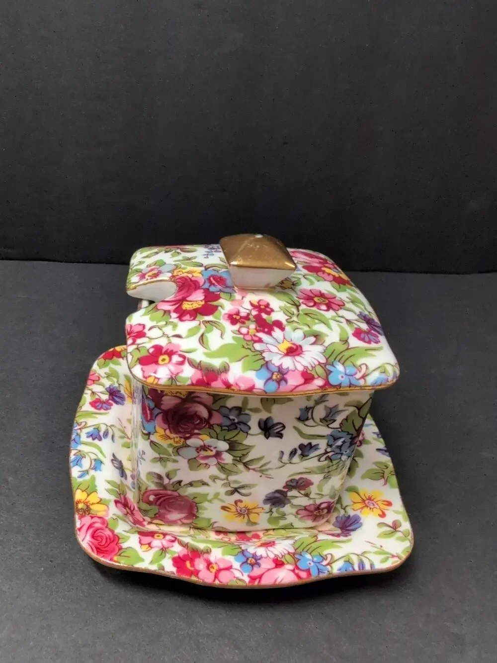 Royal Cotswolds Summertime chintz jam/jelly pot and lid with an underplate.
